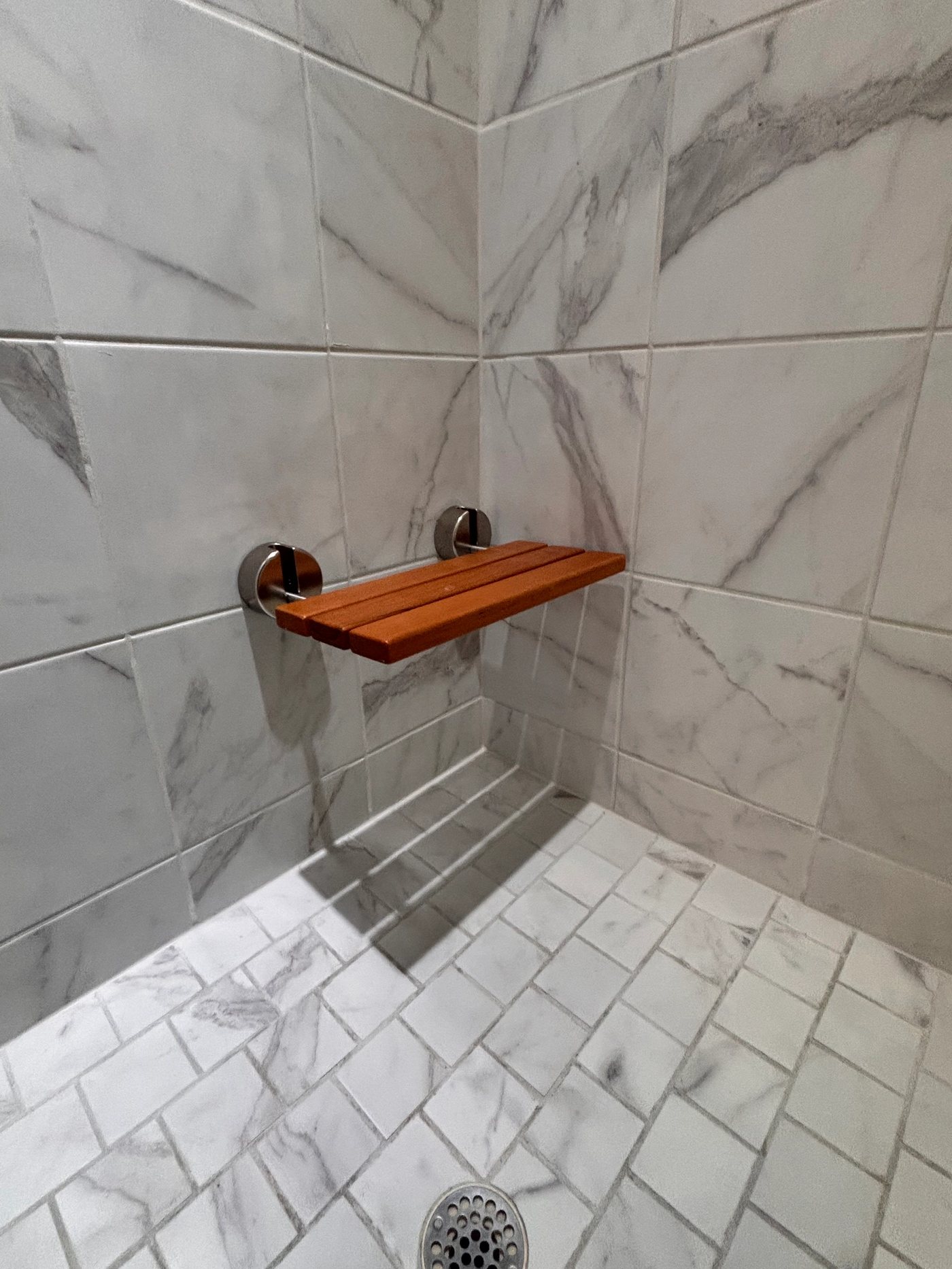 Rent A Husband project gallery photo: Teak shower seat install